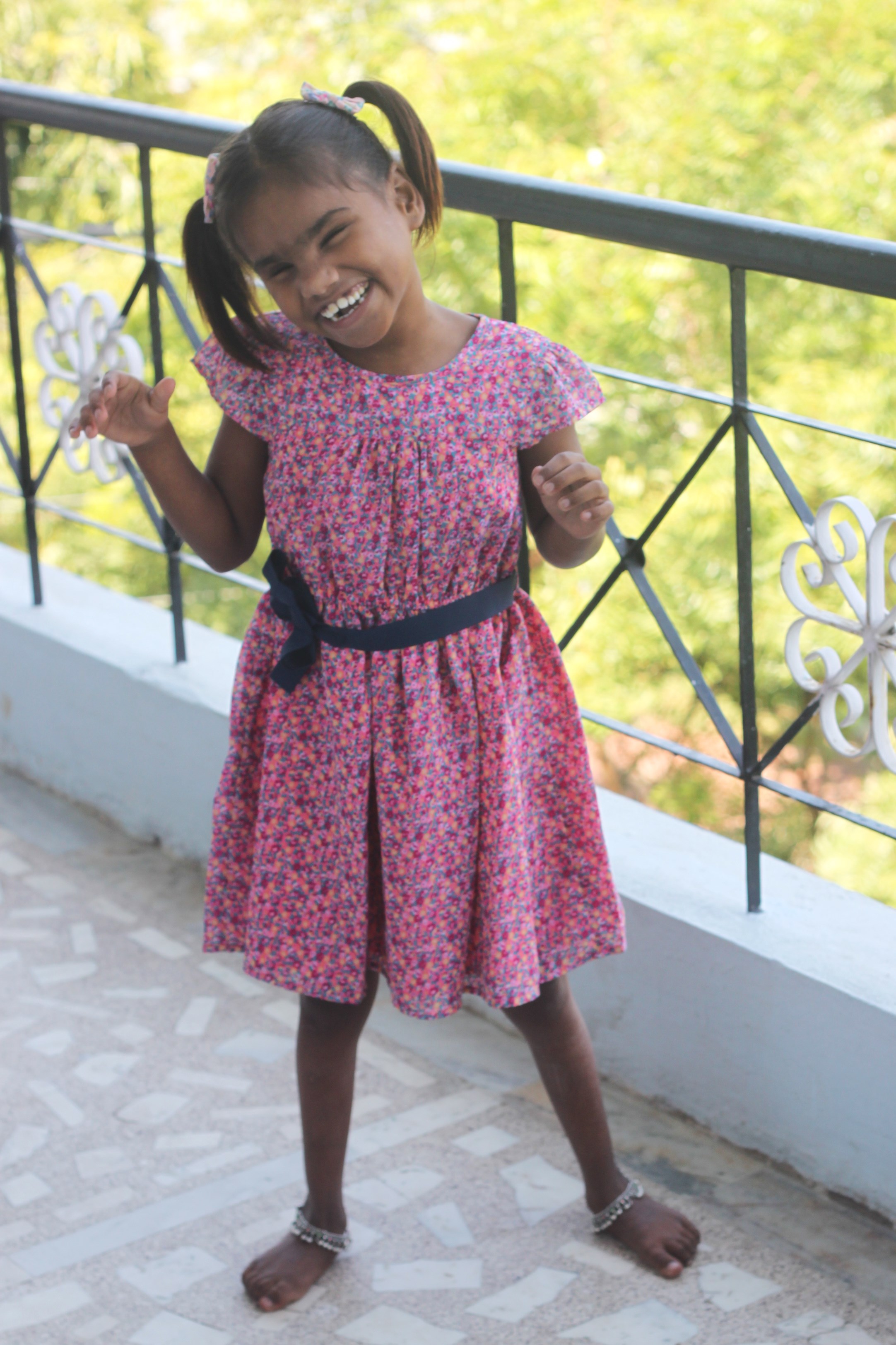 Jasmine is 7 years old and is blind and autistic. She was abandoned, then rescued. She now lives in a foster family at Sarah's Covenant Homes in Hyderabad, India. She learned how to walk this year and loves playing in the water, listening to music, and swinging on the hammock. She likes being funny and silly!